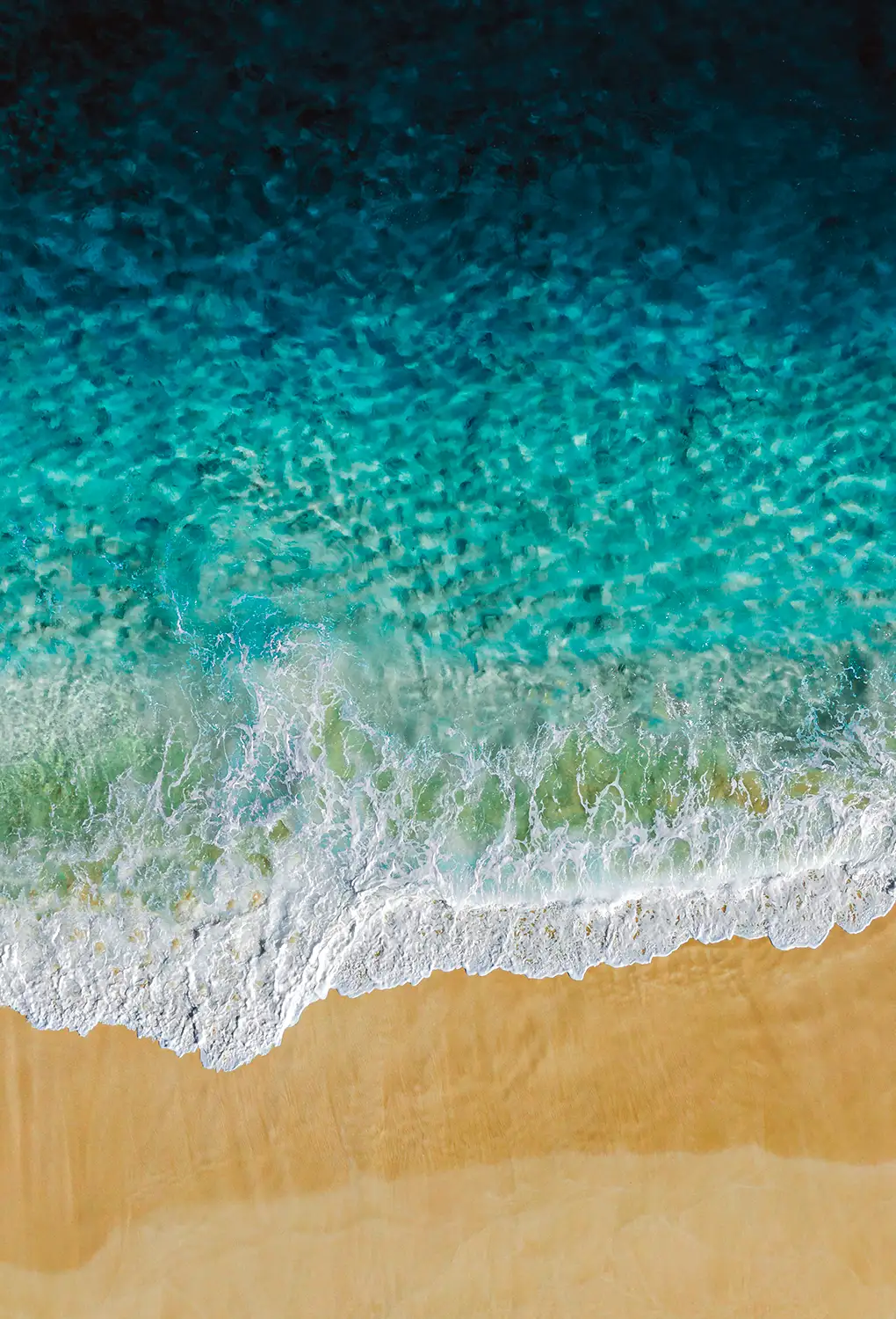 Welle am Strand, von oben
